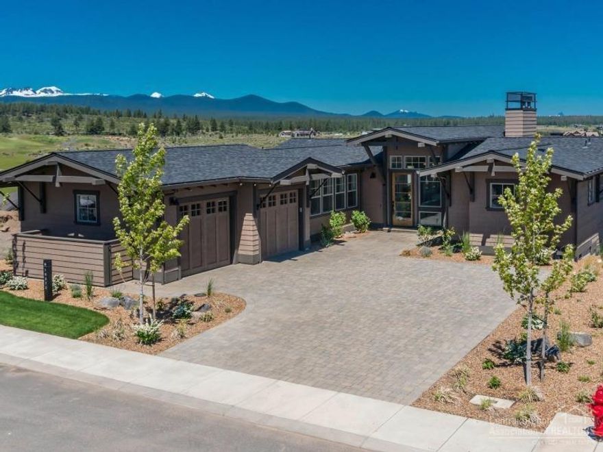 This stunning premium view lot with Cascade Mountain and golf course views is conveniently located on The Rim near the Tetherow clubhouse, fitness center, pool and 3 restaurants. Main floor master suite with fabulous bath; gourmet kitchen opens to impressive great room with large covered balcony that extends over to master suite. 2 en suite bedrooms & office on main level; 2 addl. en suites & bonus room on lower level. Still time to select from an array of designer finishes.