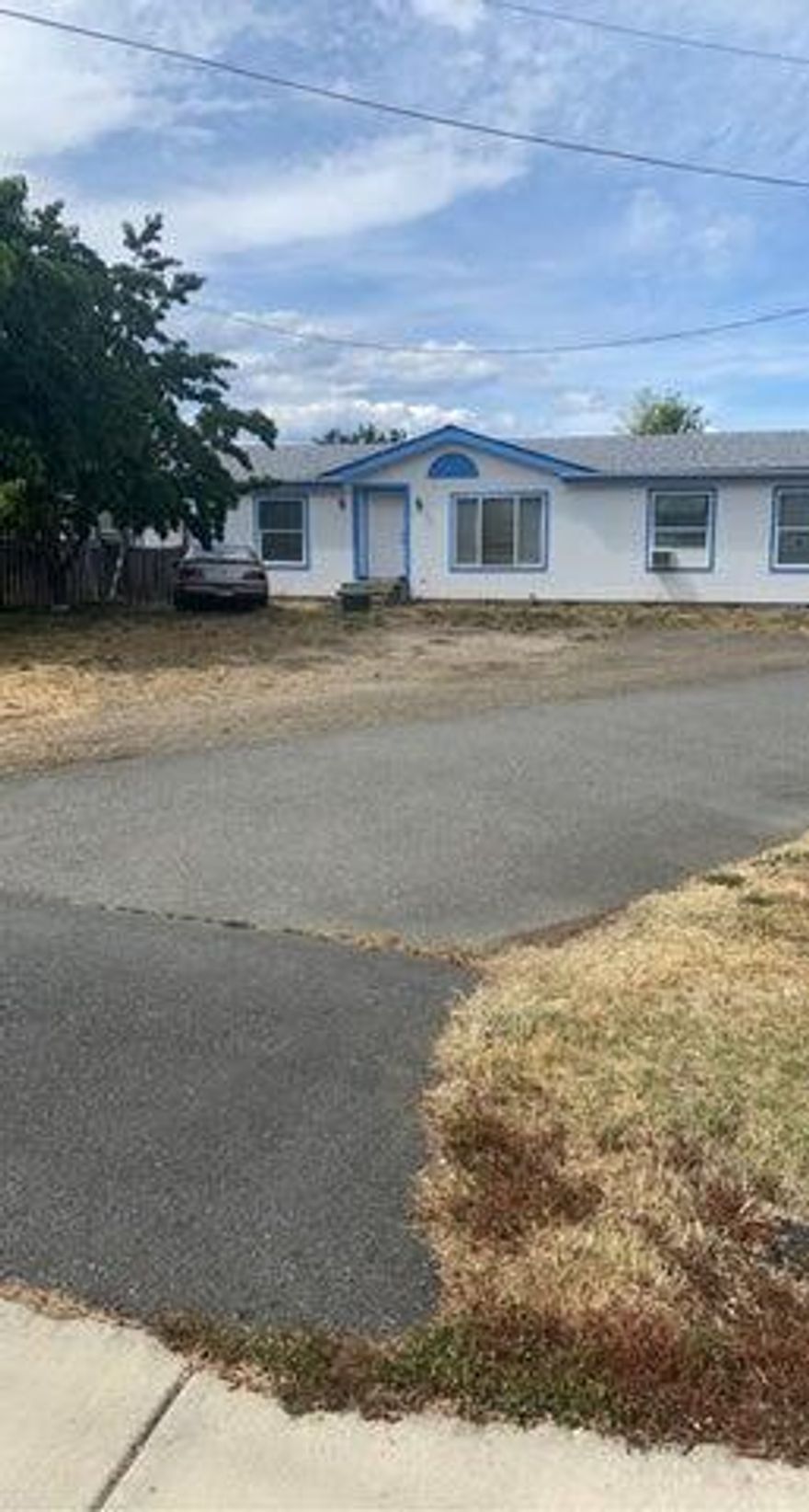 Welcome to 2720 Redwood Avenue, a versatile opportunity on a spacious 0.63-acre lot in the heart of Grants Pass. This property includes two manufactured homes—a 3-bedroom, 2-bath main home with 1,836 sq ft of living space and a second 3-bedroom, 2-bath unit approximately 1,200 sq ft in size. The main home offers both living and family rooms, a dedicated dining area, and a well-planned kitchen with functional workspace. Enjoy year-round comfort with central air conditioning and forced-air heating. The detached garage, extended gravel driveway, and RV parking provide ample flexibility. Outdoors, the large yard and private well with public sewer service offer both independence and convenience. Located near schools, parks, and shopping, this property also presents potential for subdivision—buyer to verify all uses and development options. With space, utility, and location, this is a fantastic opportunity to create value or invest for the future.