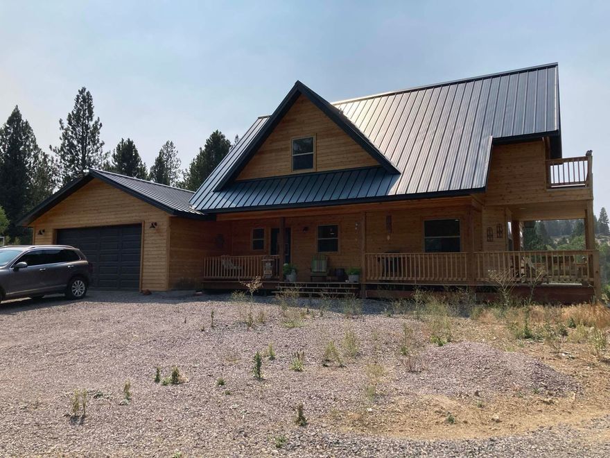 Built in 2018, this wonderful 2 story home, with approx 1450 sq ft, has so many upgrades. Home features include all knotty cedar exterior siding, an extra deep attached garage which is approx 24X36 including a work area. 3 bed/2 bath — one bedroom down stairs, upstairs has master bedroom/bath and the second bedroom/living area. Interior siding is all 6'' tongue & grove knotty pine, all cabinets are hickory, copper farm kitchen sink, oak butcher block counters, center island has oak counter to which includes a special cabinet for a baking mixer. Bamboo floors, ductless heating/air, Quadro Fire pellet stove & a propane stove. Alder front door that has side light inserts on either side for extra light, additional interior doors are pine, utility room. This property is in the Rainbow Park on the Williamson River Subdivision. A MUST SEE.