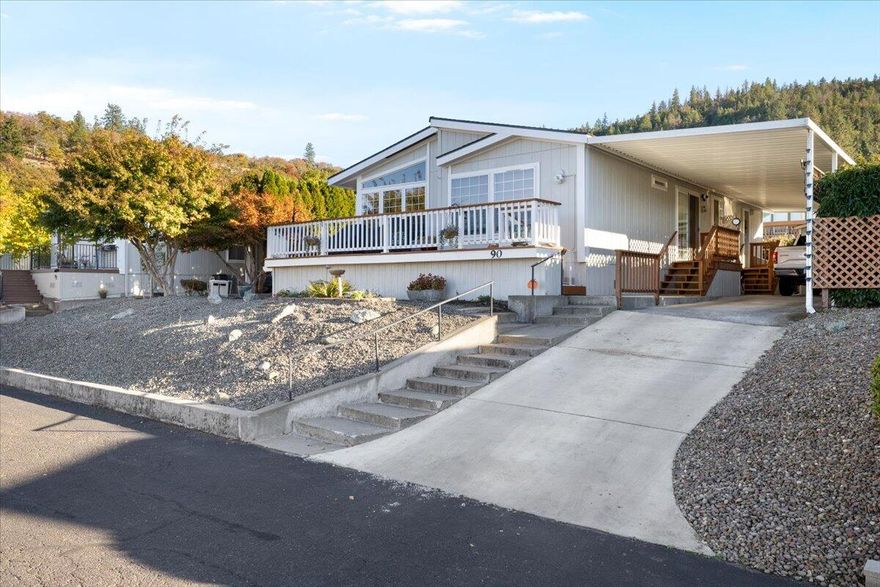 Welcome to this beautifully remodeled 2-bedroom, 2-bathroom home in Western Carriage Estates, a quiet, well-maintained 55+ park perfectly positioned between Medford and Jacksonville. This residence has been meticulously remodeled inside and out with extensive renovations that show in every detail including new appliances. The inviting living room flows into a versatile bonus room. The kitchen features a convenient double oven, and a dedicated laundry room adds everyday functionality. Gorgeous views provide a picturesque backdrop to this move-in-ready retreat.