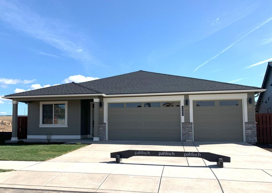 Presale purchase entered for comps only. This new, beautiful single-level home built by award-winning Pahlisch Homes boasts 4-bedrooms, spacious 3-car garage on a large corner lot with front porch facing iconic Barnes Butte. Generous open great room has a gas fireplace, spacious kitchen w/island eating bar and dining area leading out to a covered back yard patio. Buyer may personalize their interior selections if they purchase before end of framing! Quality finishes include solid Alder cabinets, quartz counters in kitchen & baths, full-height tile backsplash in kitchen, spacious primary suite w/ spa-style soaking tub and a tiled shower, water closet, and WIC. Neighborhood amenities include pool, park, playground, ½ sport's court, paved walking path along protected wetlands & entrance to ~600 acres of public trails venturing up Barnes Butte. Harrison F. Photos of similar unit, specs vary. Visit & tour model home at 1007 NE Hudspeth Cir, open Fri-Mon, 12-5 pm.