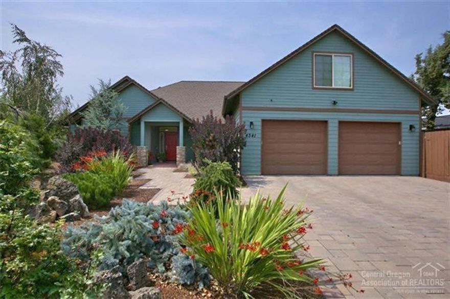 This Solaire built custom GREEN home sits in a quiet cul-de-sac on .49 acres. It offers 3 bedroom suites (2 on main), Earth Advantage & ADA compliant features & low operating expenses. The oversized kitchen has stainless appliances, silestone counters & alderwood cabinetry. Enjoy radiant in floor heat, solar/gas hot water heater, central vac, murphy bed & built-ins, sunroom, 2 covered patios, air filtration system, RV parking with dump/elec, storage shed & 2 car garage with additional shop area.