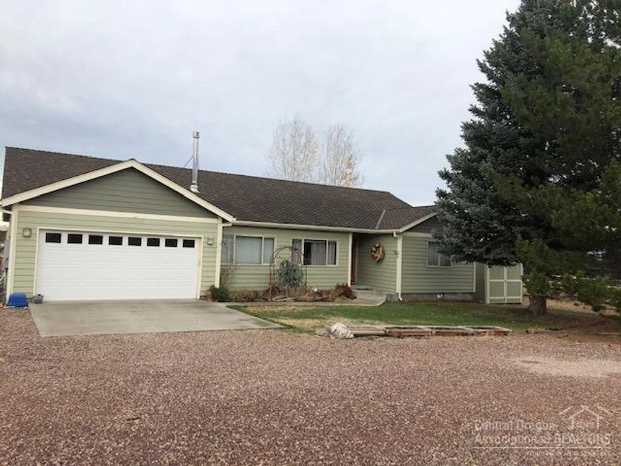 Fantastic opportunity in desirable Red Cloud Ranch Subdivision. Nicely laid out 1800 sq ft. single level floor plan. Large open kitchen with plenty of storage and nicely sized bedrooms. Plenty of room for outdoor entertaining! Beautiful Cascade Mountain views that won't dissapoint! Large barn/shop with lean-to. Bring your animals and toys. Newer paint and roof.