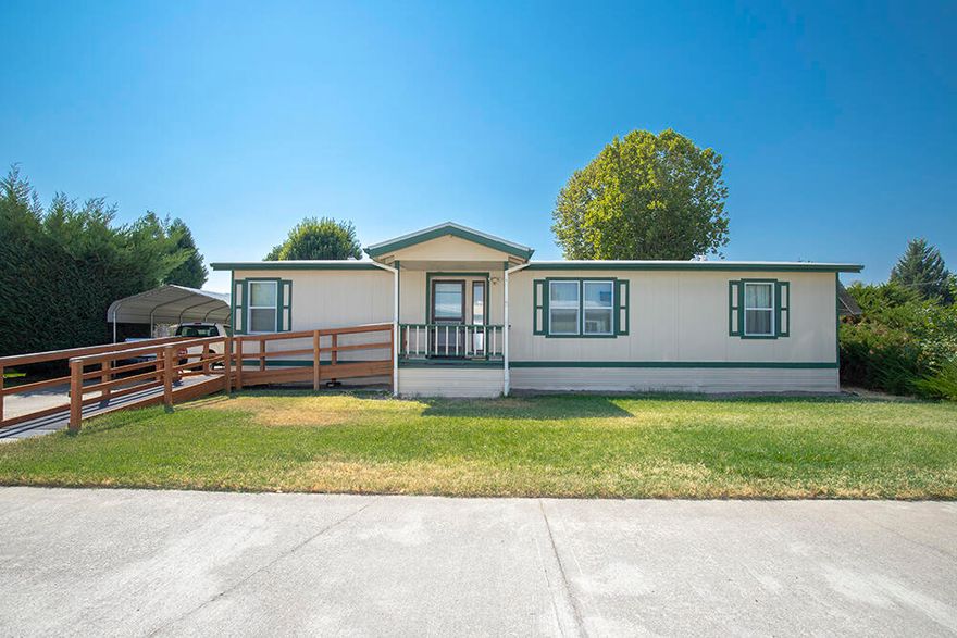 This cute, well-kept 1224 sq. ft. 3 bed, 2 bath home is located in a 55+ subdivision with a nice ramp leading to the front door. Check out the upgrades that have been done in the past 5 years: new roof, floors, vinyl windows, walk-in shower, and heat pump. The master bedroom is a good size and has a walk-in closet. The outdoors are inviting with a covered front porch and a covered back patio. Need extra storage? The large 10' x 12' shed is included in the sale.