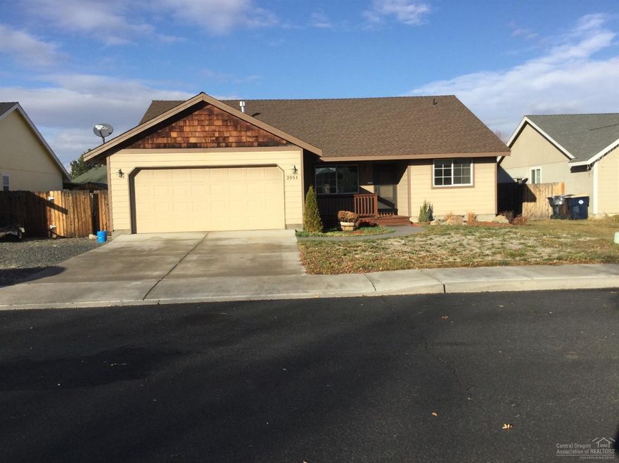 Lovely split living single level home in NW Redmond. New Laminate wood floor in Living Area. Bright open Kitchen with eating Bar. Vaulted ceilings. large utility room with extra storage. Finished Garage with Opener. Large back yard with storage shed and covered back patio. Gravel area for Small RV or boat. Great Location.