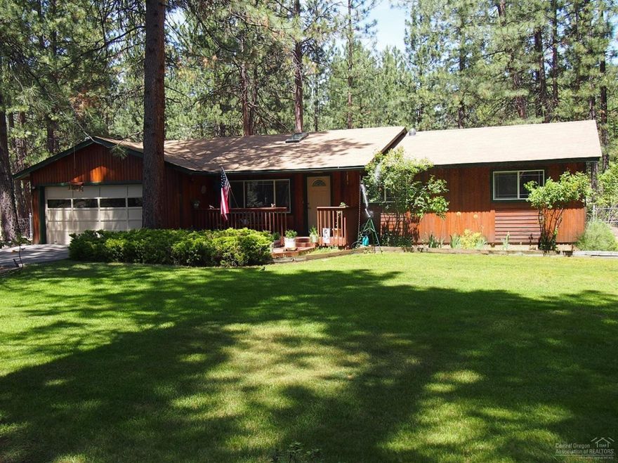 Welcome home to this country style gem in a park like setting! Just close enough to town for convenience but feel like you're in the country. This home is on 1.04 acres with a double car attached garage and a separate 864 square foot insulated and heated shop! Plenty of RV parking and privacy at this home. Lovely landscaping, with decks a water feature and hot tub included. Take a look at this well cared for single level home and imagine the peaceful, comfy, lifestyle it will bring.