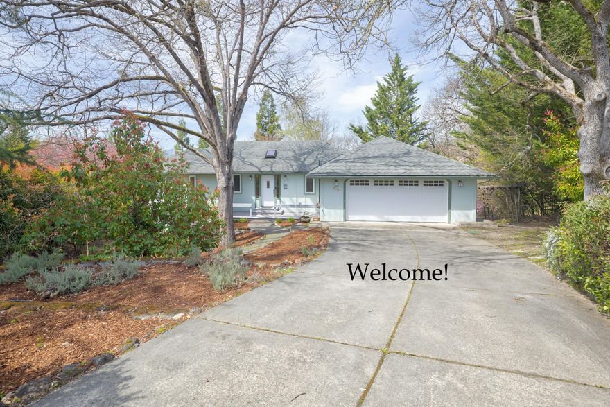 Beautiful well-kept, 2196 SF,  4 bedroom, 3.5 bath home on .40 acres with panoramic city and mountain views, built in 1996. Main floor features a primary bedroom suite with charming French doors opening to a wood deck, an open concept kitchen, a living room with a gas fireplace, as well as a laundry and ½ bath. Lower level has 3 bedrooms, 2 full bathrooms, storage area, and a bonus room with a slider opening to a covered patio. Large, private lot with mature landscaping including fruit trees, on a cul-de-sac in a desirable NE Grants Pass neighborhood. Oversized 2-car garage. Roof new in 2018, brand new A/C, French drain. Appliances include Refrigerator, DW, Washer and Dryer, Range, Microwave, Ring Doorbell. No association or HOA.