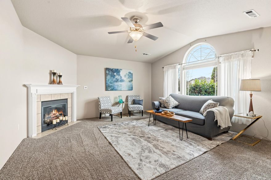 Impeccably maintained 3-bedroom, 2-bath home built in 2006, perfectly situated in a desirable East Medford location with stunning mountain views. This sought-after open floor plan features elegant granite countertops, sleek stainless appliances, & durable tile flooring. Cozy up to the gas fireplace in the spacious living area, highlighted by vaulted ceilings & abundant natural light. The primary bedroom offers a relaxing en-suite & generous walk-in closets, complemented by a dedicated laundry room for convenience. Enjoy both separate living & family rooms, perfect for entertaining or everyday living. Step outside to a beautifully landscaped backyard boasting raised garden beds, ideal for gardening enthusiasts, while the front yard is designed as a charming country garden retreat. Brand new, never-lived-on carpet adds fresh comfort inside, paired with newer exterior paint & a water heater replaced in 2020. Features include a black & white checkered garage floor! CHECK OUT THE VIDEO!