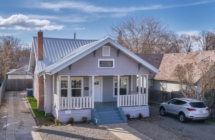 Two single-family homes on one lot!  Located on a street of well-kept homes. Front house is a 1552 sq./ft., three-bedroom craftsman with natural hardwood floors and an abundance of functional built-ins. Layout includes an open-concept living room filled with light and adjacent family room that could serve as formal dining. Home is open and inviting with its 9 ft. ceilings and updates throughout. Features include newer interior paint, double-pane vinyl windows, updated kitchen with newer appliances, recently remodeled bathroom and forced air heating/AC. Back home is a cute 1 bed/1 bath cottage of 768 sq./ft. with modern touches and an attached 1-car garage. Cottage was also recently updated. It is fully fenced with a private outdoor space for entertaining or relaxing. Private entrances for each home and separated by a 6 ft. fence. Low maintenance landscaping perfect for owner occupancy or investment. Call for details. Thank you for respecting