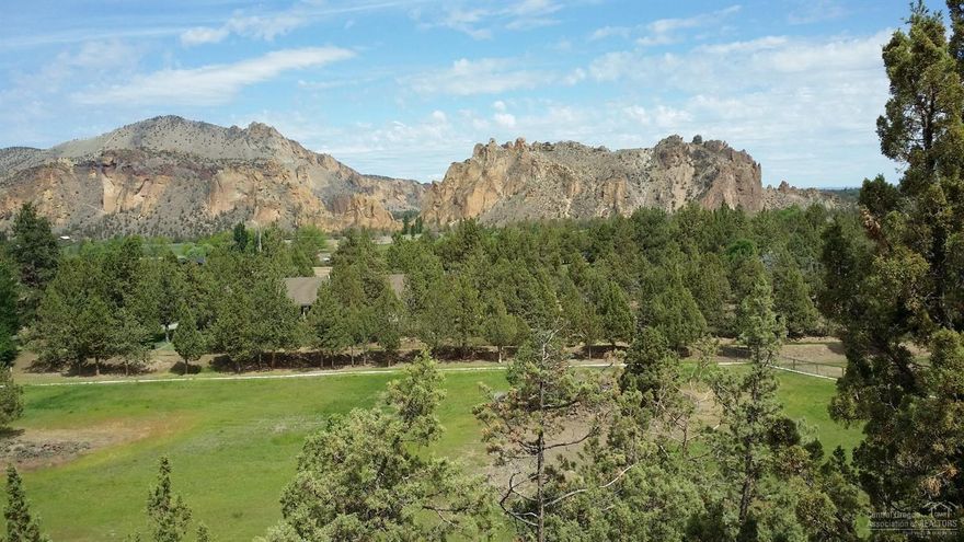 Million Dollar views from this 21-acre piece of Heaven, at the end of a quiet rd. Exquisite views of Smith Rock & the surrounding farm lands from the building site on a bluff. Septic installed for a 4-bedroom home & power to a drilled well & a 1296 SF shop. Also included is a 2880 Hobby Barn. This property has irrigation and though not currently in farm deferral, MUA 10-property could qualify for such. This property is just waiting for your custom home to be added to the tranquil, amazing surroundings.