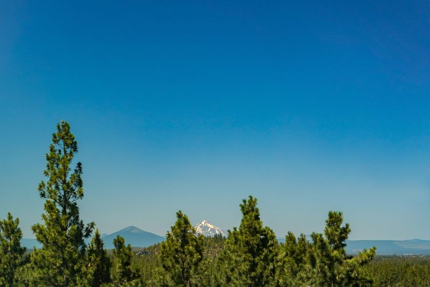 Situated on Bend's West side in the new Marken Summit neighborhood, located near shopping, schools and restaurants. This Northwest Modern style home features a creative selection of finishes and an efficient floor plan fit for any buyer. This one features a designated office on the ground level. On the second level you will find the kitchen, living and dining area, and a beautiful patio with a view. Kitchen features custom cabinets, slab quartz countertops, and stainless steel appliances. Upstairs are 3 bedrooms as well as a loft and 2 full baths. The impressive primary suite featuring large walk in closet, tiled shower, and double vanities and amazing Cascade mountain
views! 2 car garage. Earth Advantage Certified and built by Stone Bridge Homes NW.
