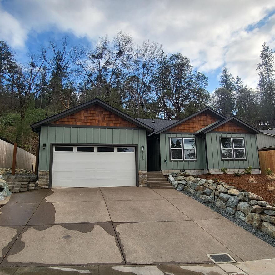 Brand new 1399 sq ft Home 3 bedroom 2 bath home in south Grants Pass. Well designed open floor plan, with Granite Counter Tops, Stainless kitchen appliances (Ref, Range/Oven/Microwave, D/W), Shaker Alder cabinets, black trim plumbing and light fixtures, LVP simulated wood flooring, LVP tiles in the laundry and bathrooms, and single panel doors. Low maintenance yard, convenient location turn key home.