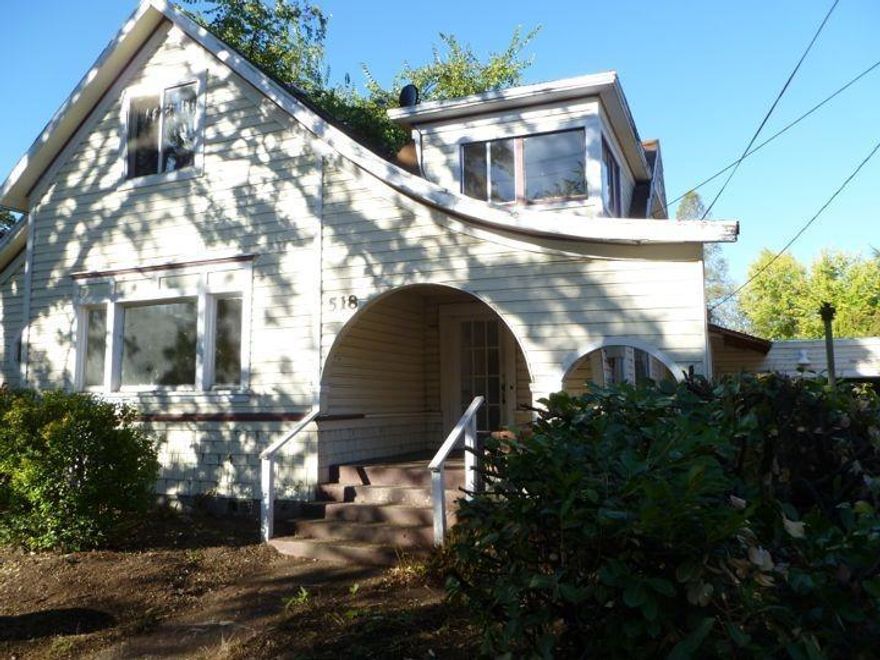 Once a large elegant home that has been converted to a fourplex. This property has lots of room and possibly could even fit more units (Buyer to do own due diligence). Main home downstairs features 2 beds and 2baths and there are two one bedrooms and a studio apartment upstairs. This needs lots of updating and work but it may be worth your time so come check it out.