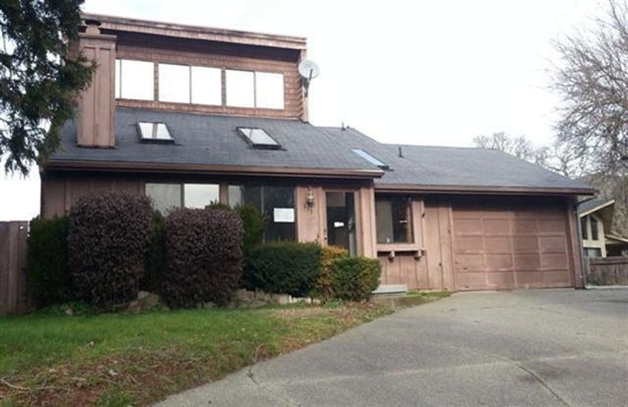 Quiet at the end of the cul de sac. 2 story with master bedroom loft. Pine interior. Open vaulted ceiling for kitchen and living room. Fenced yard. Good curb appeal. Needs repairs but look at the price!