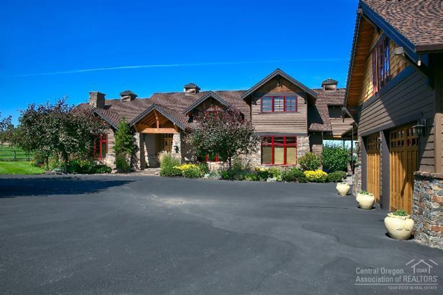 The sophistication and style of this Tumalo home sits beautifully on 18.75 acres with 16 acres of irrigation. Vast Cascade Mountain views and impeccable landscaping envelop this abode. High vaulted ceilings, large windows, wood flooring, wood beams and crafted stone work complete this charming home. This 5328 sq. ft. home includes a luxurious master suite with radiant floor heating in the master bath. Designed by Rick Wright, this 5 bedroom, 4.5 bath estate provides a truly exclusive Tumalo property.