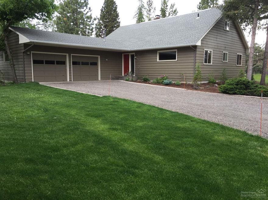 Beautiful irrigated acreage home near town and expansive new park with proposed trails and river access. 2,209 sq ft updated home. New warm windows. New porcelain tile counters, all new stainless appliances. Open, social kitchen & fireplace spaces with cascade Mt Views & majestic Ponderosa trees. 2.5 bathrooms, wood doors, all wood trim. Enjoy the bench at the Aspen accent pond. Green pasture, space for horses, RV parking, garden, build a shop. Quiet area in NW Bend. New septic tank & drainfield.