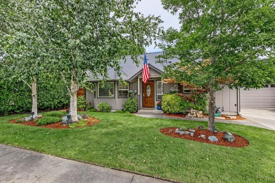 Beautifully updated 4 bedroom 2.5 bath home in a convenient E. Medford location. Home was remodeled in stages over the last 10 years. The master bedroom and bath were expanded with walk-in closet, new vanity and expanded shower and the 4th bedroom serves well as an office. The kitchen has newer hickory cabinets with pullouts and pantry area. Newer laminate floors grace most of the main level. Living room has vaulted ceiling and bay window. Carpet in the bedrooms is newer with a nice pad. Heat is gas forced air along with gas water heater and fireplace in the family room. Out back is a large yard with a large multi-tiered water feature. It's like having a creek in your own yard. There is a nice shed that is approx. 12X16 and a second garden shed. The property also boasts room for an RV. Ramada Drive is located off E. McAndrews in a quiet, well established neighborhood.