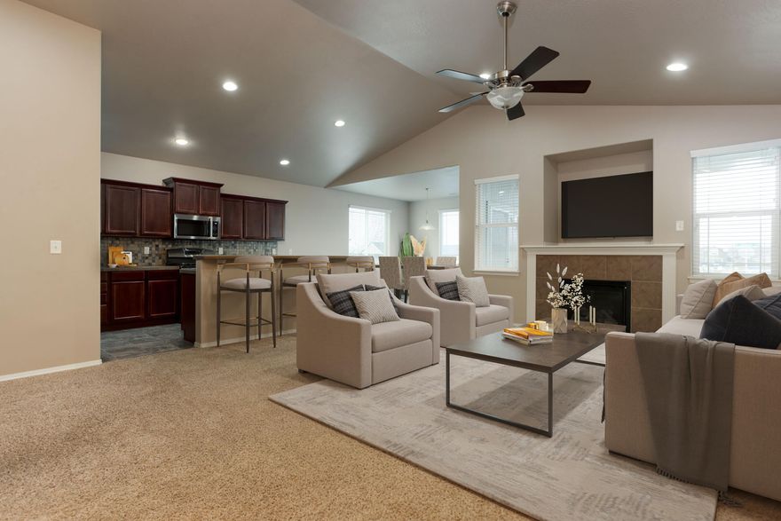 Don't miss this well-kept 1,800 sq. ft., single-story home! This 3- bedroom Charmer's perfect layout features a large kitchen with pantry and breakfast bar. Warm up in front of the gas fireplace located in the great room off the kitchen & eating area. Come relax in the primary suite conveniently located off the main living space. The large primary bath has a double-vanity, soaking tub, and large walk-in closet. Great location too--only blocks from West Rim City Park/Dry Canyon Park.