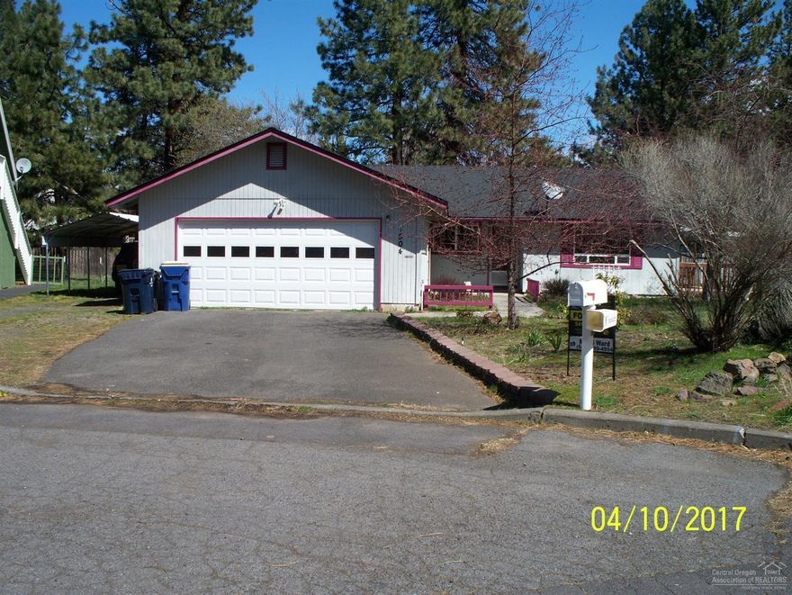 Home located in SW Bend on a cul-de-sac. Large lot with fenced backyard. 3 bdrm, 2 bath home with 2 car attached garage and a detached carport. Roof was replaced in 2006. Patio is located off of the dining room. Home needs a little updating but has great bones and in a good location. Seller will give buyer a $3,000 flooring allowance at Close of Escrow.