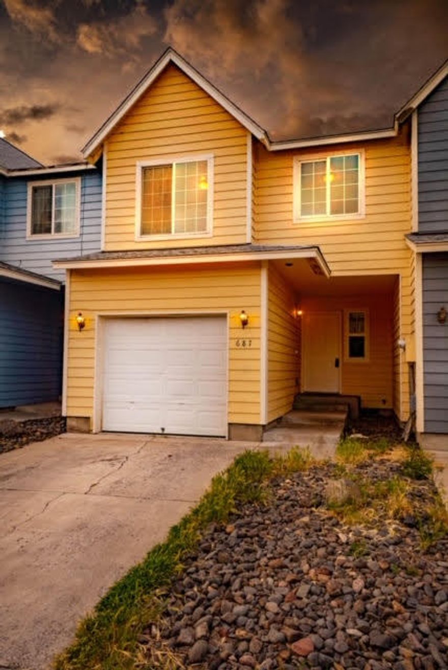 Adorable 3-bed, 2 1/2 bath townhome with your own, private garage. Great room with laundry on the main floor.  Slider opens to fenced yard that backs to Ochoco Creek.  The upstairs features three bedrooms; additional storage and a spacious master suite with walk in closet and full bathroom.  Sliding door in the master also opens to a private deck overlooking the creek.
Second townhome, two doors down also for sale; same floor plan and price. Photos represent a like property for sale by this owner that is currently vacant but has same floorplan and features.