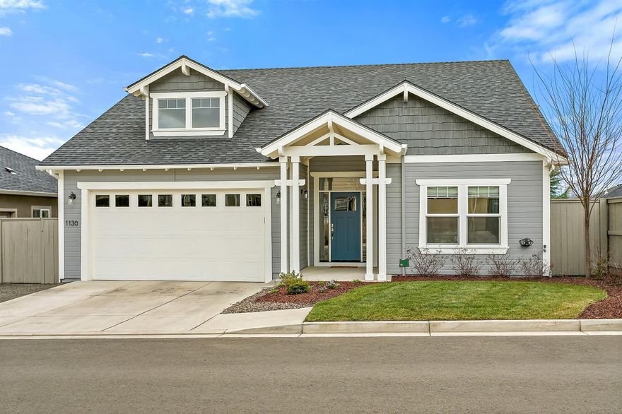 Custom, one owner Craftsman Style home located in the sought after East Medford's Eastgate Estates. Single level with three spacious bedrooms and two full bathrooms. Hardwood flooring in the kitchen, dining, living and hallway. Great natural light throughout. Nine foot ceilings throughout and a desirable open floor plan. Gas fireplace is center stage in the charming living room. The dining room offers slider access to the over-sized covered back porch where you can take in the surrounding mountain views. Plenty of counter and storage space in the gleaming white kitchen with granite counter tops. Two-car finished garage and a hard to find large back yard fully fenced with in-ground sprinklers.