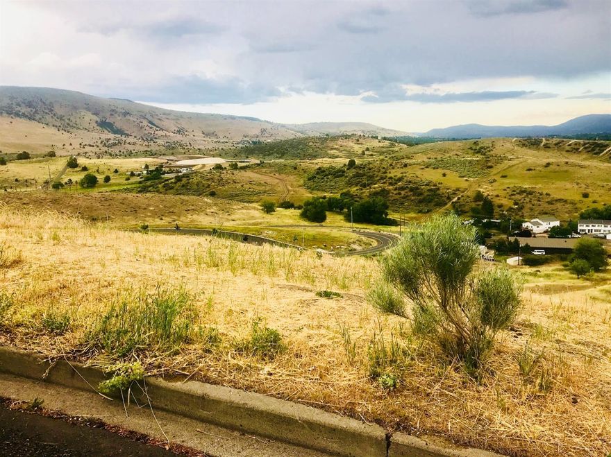 Beautiful lot with gorgeous city and mountain views.