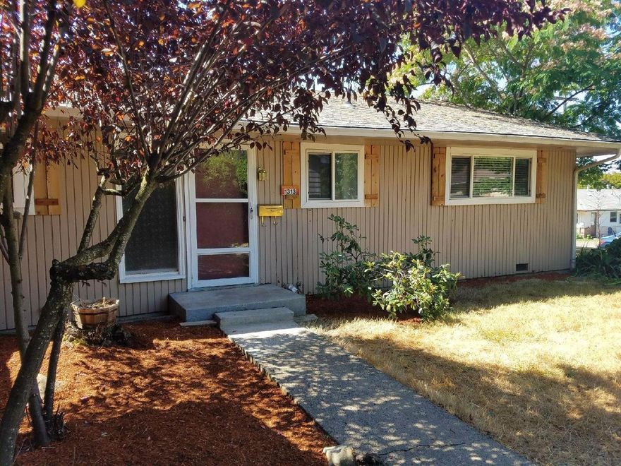 Cute 50's Home, Ready to Become Mid-Century Modern! Super single-level layout with tile, hardwood, big windows, updated heat system, eat-in kitchen, spacious living room, ceiling fans, over-sized covered patio and extra large lot with towering trees and mature landscaping. Detached single garage with room for a small shop space. GPID irrigation. Great location, has easy access to schools and shopping. Well priced for the upgrade enthusiast!