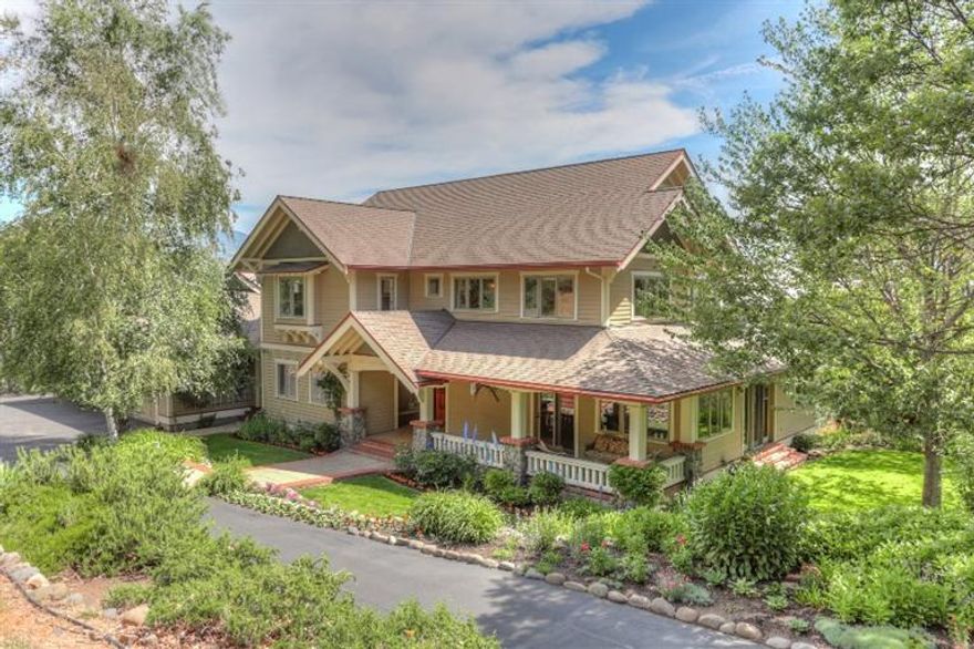 A rare offering in the desirable, close in, Morninglight area, this Craftsman home, built by the Shostrom Brothers, combines quality construction with gracious, rural living. This 5 bedroom, 4-bath home boasts cherry cabinetry, hardwood and ceramic floors, crown moldings and 9' ceilings. Main level offers a spectacular chef's kitchen with box-beam ceiling, granite counters, Wolf cooktop, large island and charming upholstered breakfast nook. Family room has 2 built-in desks, bookshelves, several cabinets and access to grassy side yard and front porch. Formal LR with fireplace, French doors to wrap-around deck, panoramic valley views, access to garden paths and Boules court below. Main level bedroom is adjacent to bath and generous tiled laundry room. Upper level features private master suite with fireplace, walk-in closet and an all travertine bath with heated floors. Three additional bedrooms, two with ensuite baths and one with access to finished attic. 3-car garage with workbenches.