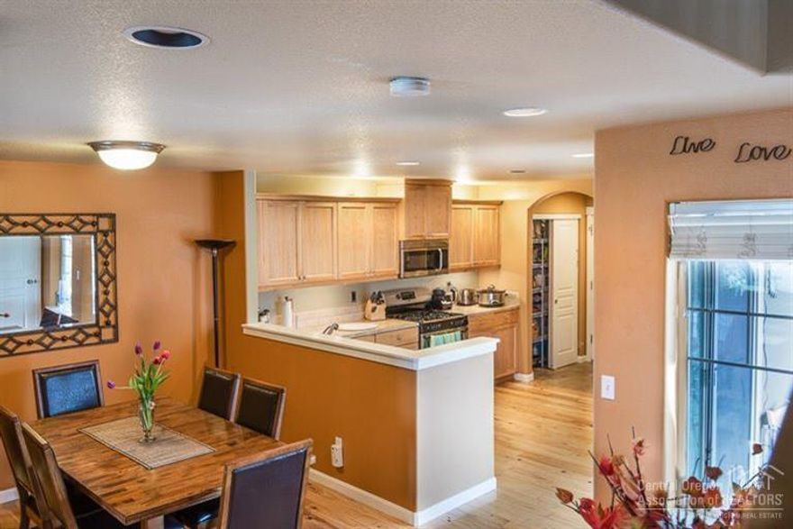 Lovely Cottage, across the street from Sun Meadow Park on a corner lot! Rare find! Great room has a cozy corner gas fireplace. Kitchen includes stainless fridge, appliances, & Hickory hardwood floor & custom cabinets. Powder bath on main. Utility room, 3 bedrooms & 2 full baths upstairs. Good sized master suite. 2 car garage has alley access. Nice corner lot side yard! Enjoy the friendly neighborhood's community pool, toddler pool, picnic areas, a delightful park, paths, plus kids can walk to Jewell school!