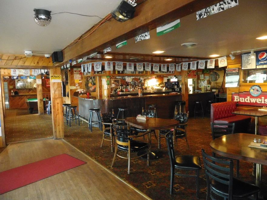 Successful Restaurant, Bar and Lottery business. Established in 2004. This offer to sell includes the real property and the business including all fixtures and equipment. Excellent high traffic location on prime corner in this fast-growing resort and retirement community. Highway 97 is a main North-South corridor through Central Oregon. Single-level 3,931 square foot building with large 1.28 acre paved parking area with drive through access. Sellers are active in the business operation and will train and assist new owners in 30 day transition.