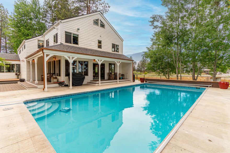 Extensive remodel in 2022/2023 you will find a timeless, remarkable retreat nestled in the heart of Bend Oregon. This captivating property offers 14.67 acres with 5.2 acres of water rights, surrounded by lush greenery & majestic trees. Step inside & you'll discover a home that effortlessly balances elegance with functionality. High ceilings, large windows, skylights, natural wood & tasteful finishes add to the sense of sophistication. Feel inspired by the gourmet kitchen featuring commercial gas range, spacious island & two-sided gas fireplace. Primary suite boasts private balcony & luxurious en-suite bathroom with soaking tub and tiled walkin shower. A large bonus room, sauna, pool, hottub & seasonal canal are a few of the incredible features of this property. Equestrian enthusiasts will adore the tack room, 2 stall barn with runs, new fencing, 4 loafing sheds and easy access to riding trails. Review the features list, schedule a showing, and experience the magic. Your dream awaits.