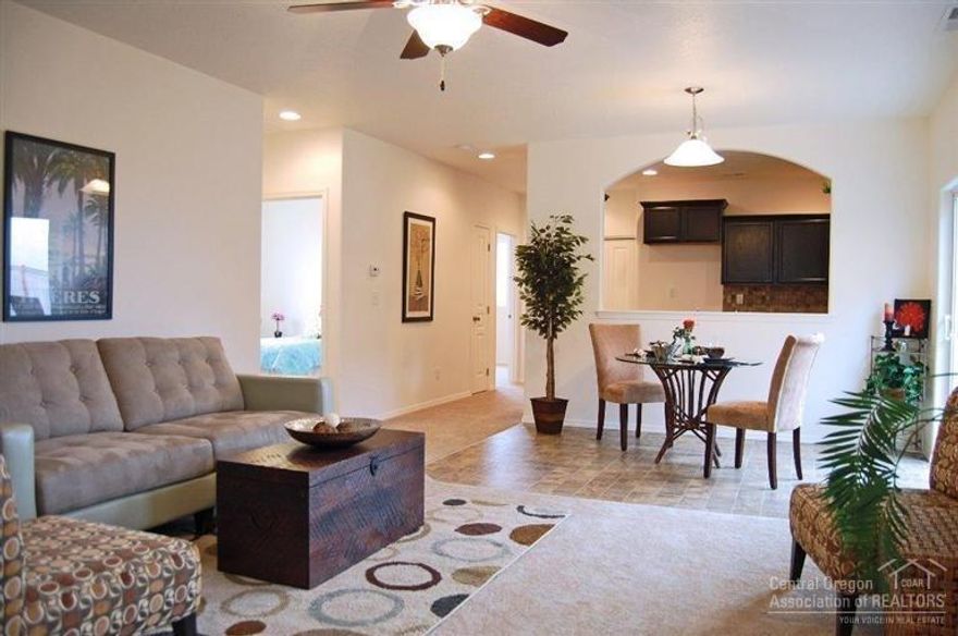 Personalized Canyon floorplan. Open concept living room adjoins the dining room, and the efficiently planned kitchen boasts ample counter space and cupboard storage. Master suite features a dual vanity bathroom and generous closet space. Single level. Conveniently located 3 miles to Old Mill District and the Deschutes River. Pictures are of similar home. Build time approx. 5 months. Multiple upgrades and lots available.