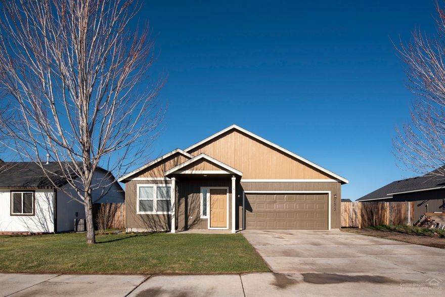 Well-maintained Redmond home conveniently located across from a park as well as near Walmart and Home Depot. The well-appointed lot allows for a spacious backyard that's fully fenced, landscaped and includes underground sprinklers. The oversized concrete patio sits at 12'x17' and is ideal for entertaining. Upon entering the home, discover a tile entry leading to laminate flooring throughout the main living area. The kitchen boasts ample storage space, a gas range and eating counter. The spacious master includes a walk-in closet and ensuite bathroom. The home also includes custom cordless blinds, gas forced air heat and central AC. Topping it off is a finished garage, newer interior paint within the year and a freshly painted exterior.