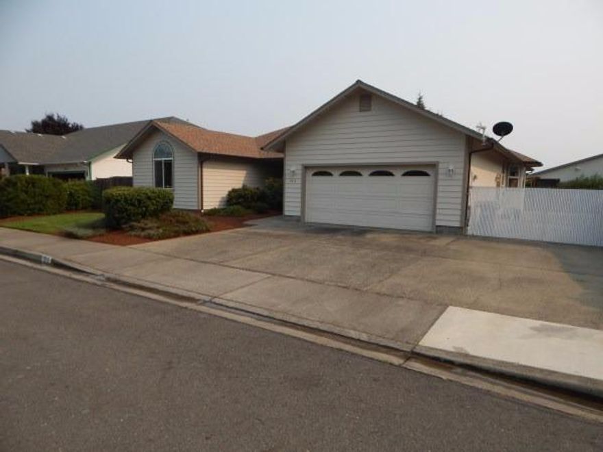 Pride of ownership in Wagner Meadows! This single level home built in 2000 features 3 bedrooms, 2 baths, approx. 1831 sqft., hosting lots of light, vaulted ceilings, living room and formal dining room. Nice open Kitchen with breakfast nook and large walk-in pantry. It also has, Ceiling fans, Walk-in closet, FA Cooling & FA Gas Heating, piped for central vac system, Covered Front, Back & Side Patios, Attached 2 car Garage, In ground Sprinklers & Drip System feed the low maintenance landscaping. Lots of parking including behind fence RV parking with sewer dump. Close To the ALL SPORTS PARK, Move in ready and priced to sell quickly!