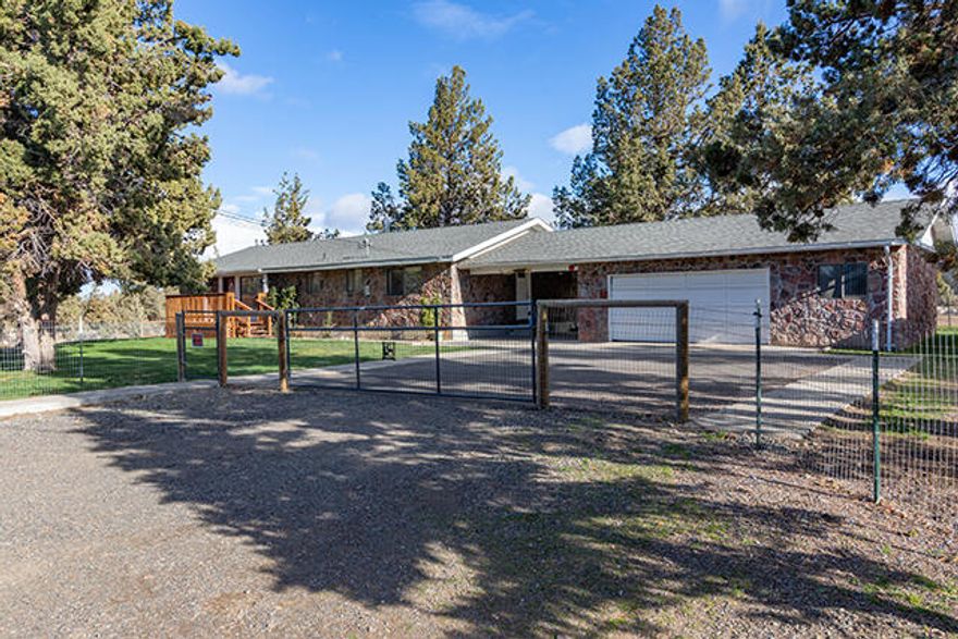 Great horse property!  This single-level home sits on over 2.5 acres in Rimrock West Estates.  It includes a barn with a stall, tack room, hay storage, and a cellar.  There is covered RV parking, a brand-new shed, and the property is fully fenced and cross-fenced.  The home has a ''rock finish'' exterior, newer roof (2016), and front and back porches.  Inside features include granite countertops in kitchen and bathrooms, laminate flooring, large laundry room, and mini-split ductless system in living room.  The garage is an oversized 2 car garage and connects to the house with a breezeway for additional covered parking/storage, or access to the back of the house.   Convenient access to dry canyon trails for walking, biking or trail riding.