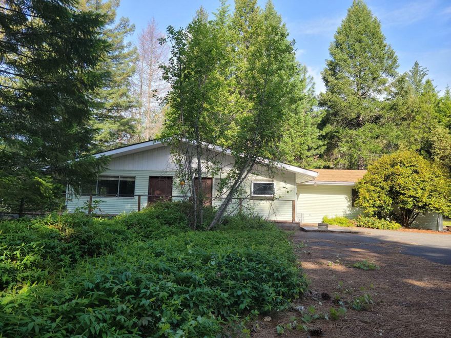 Well-built home with1808 square feet. Two bedrooms and two baths on 1.24 acres. There is a daylight basement that has a family room and a room that could be used as a third bedroom. Large living room with sliding glass doors that open out onto the wrapround deck. Two car attached garage, has a half bath in the garage. Close to town, Make an appointment today!