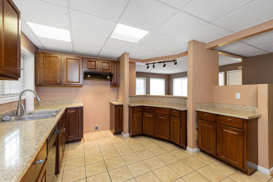 Located in a nicely manicured 55+ Community, this home has an open layout that feels bright and inviting. There's a dining area, a cozy spot for a reading nook or office, and a roomy living space. Both bedrooms have attached bathrooms with tile floors and a shower/tub combo. The primary bedroom is oversized with a big vanity and great storage. You'll also find vinyl windows, indoor laundry hookups, two entrances, an attached carport with a storage shed, and an enclosed porch for extra space. The yard is low maintenance and easy to keep up. Community amenities include a clubhouse with kitchen, library, billiards, car wash area, and laundry. Residents enjoy monthly activities like potlucks and game nights. Space rent is $800/month plus water and sewer. Garbage is included. Conveniently located near shopping, restaurants, Costco, Trader Joe's, and the bus line.