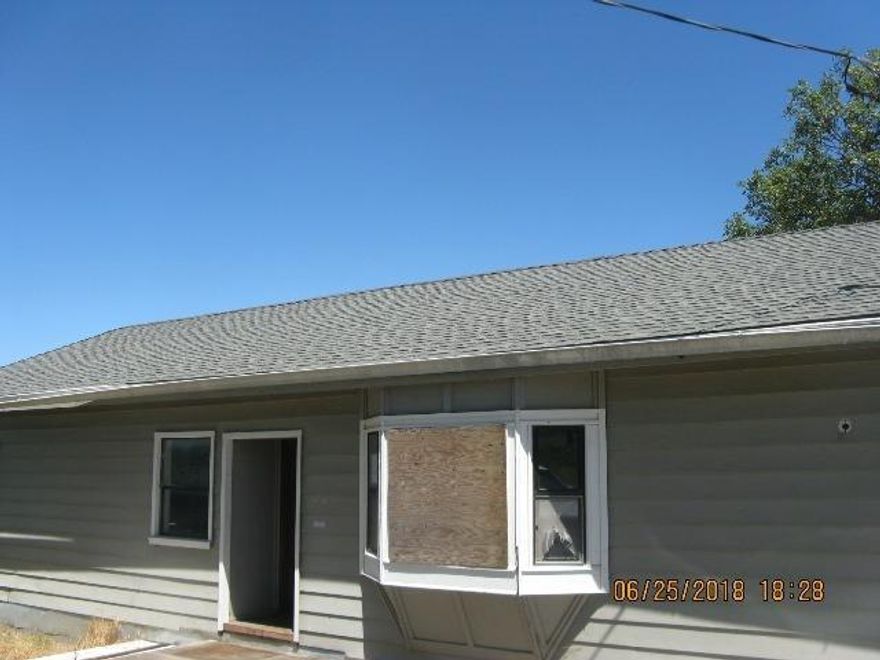 Nice size lot with ranch style home, power, well and septic on site. Interior of home is in very rough condition and the foundation is questionable. Great opportunity for investor to rebuild or replace with a brand new home or mobile! Seller requires cash purchase only - seller will not perform any repairs - as is sale.