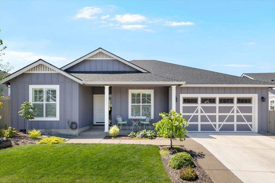 East Medford convenience but feels like you're miles away. This incredible Pacific Trend Building Company home was built in 2022 and features 1870 sq ft, 3 spacious bedrooms and 2 bathrooms. Walking in you'll find vaulted ceilings, large windows with mountain views, high end finishes like luxury flooring, textured granite countertops and cabinets made with birch and alder. Living room features high quality built-ins and a stone fireplace. Kitchen is spacious and open with an oversized island and a classic craftsman style. Fantastic private backyard with a covered patio to enjoy the impressive views. Located just a short distance to Centennial Golf Course, Padigan Winery and Roxy Ann Winery.