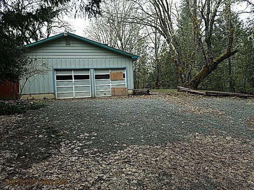 Price Reduced. A spacious setting set away from the road. Relax Summer evenings in your enclosed and screened back porch. Enjoy the custom painted bedrooms or sit by he fireplace in the Winter