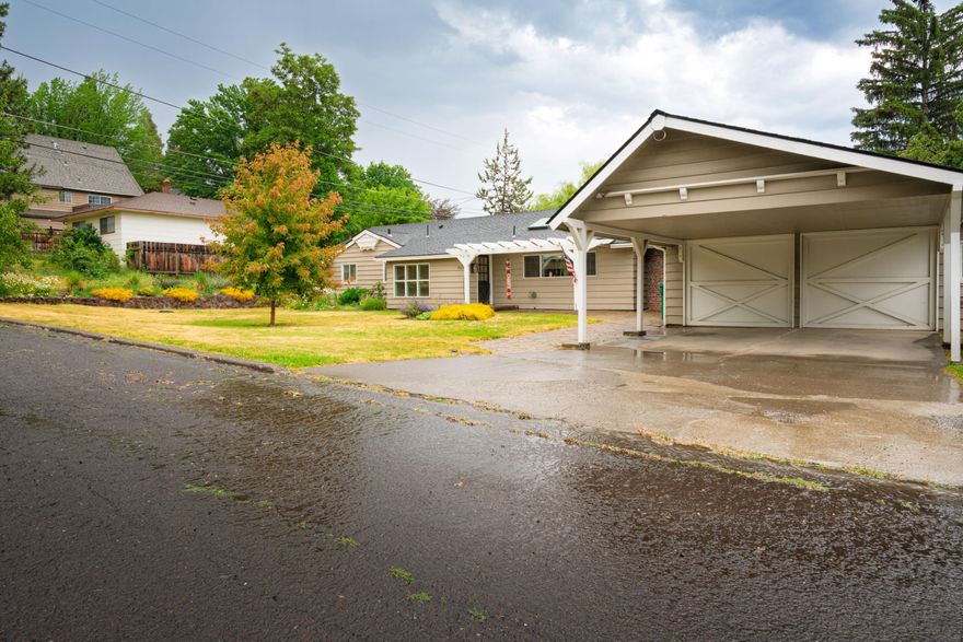 Large one level 3-Bedroom, 2-Bath Home located just minutes to OIT, Sky Lakes Medical Center and downtown. This charming home features a beautiful kitchen, a spacious primary bedroom, and a bonus room that can be whatever you need—office, playroom, or extra hangout space! The large backyard is perfect for relaxing or entertaining, and there's a nice deck for enjoying the outdoors. Plus, the storage shed and attached carport add extra convenience. Come check it out!
