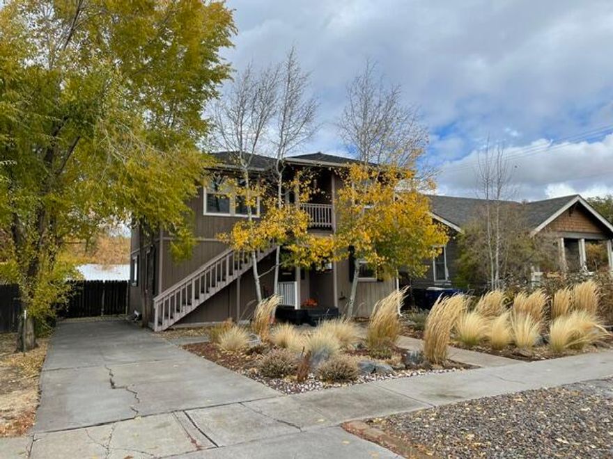 Your Ideal Bend Basecamp-Live, Rent, or Invest in the Heart of It All! Perfectly positioned between Downtown Bend and the Old Mill District, this nicely maintained and updated duplex puts the very best of Bend right outside your door. Enjoy an easy stroll to local shops, restaurants, bars, and groceries—this location is unbeatable for both lifestyle seekers and renters alike. Each light-filled unit offers 2 bedrooms and 1 bathroom, featuring durable concrete floors, an open layout, and ample windows that bring in natural light. The spacious, fully fenced backyard includes raised garden beds and backs to an alley for added convenience. A large storage shed provides plenty of room for bikes, gear, or tools, and the lower unit enjoys its own private, fenced side yard—ideal for pets or extra outdoor living. Off-street parking adds everyday ease, and included plans for an additional duplex on the lot create a rare investment opportunity in one of Bend's most desirable neighborhoods!
