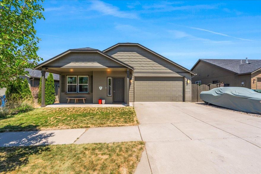 Ready for new memories! Tucked into a quiet Bend neighborhood, this home offers more than just three bedrooms and two baths — it's a retreat designed for both connection and comfort. The open-concept living area welcomes you with soaring ceilings, warm natural light, and a cozy fireplace that makes winter evenings glow. Love to cook and entertain? The kitchen flows seamlessly to the dining area and out to a private, landscaped backyard — perfect for summer BBQs, pets at play, or stargazing with friends. The primary suite feels like a sanctuary with its spacious layout and spa-inspired bath. Two additional bedrooms make ideal spaces for guests, hobbies, or a home office. Practical features like a double garage, ample storage, and low-maintenance yard mean you spend more time enjoying Central Oregon and less time on chores. And here's the bonus: this property sits just minutes from schools, parks, shopping, and trails — giving you that hard-to-find balance of convenience + lifestyle!
