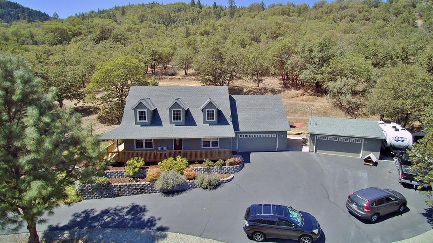 Searching for your own slice of Heaven? Stop searching because you have found it! 20 acres in Central Point, just a short distance to town! Come home from the crazy hustle and bustle and escape to peace and quiet with amazing views and wildlife.Offering 3 bedrooms, 2.5 baths, living room, family room, formal dining, a bonus area (not included in SF) and a large kitchen that opens to the breakfast nook area. The bonus room is located off of the master- use it as an office space, closet space, sitting room, or storage. There is an abundance of storage and cubby holes to put your cherished items. Vaulted ceilings, dual HVAC (one for each floor), lots of windows for natural light, a 2 car attached garage and a 2 car detached garage- use it as a shop or mancave! Enjoy the view of Mt. McLoughlin from the covered deck or watch the deer wind their way through the property from the front porch swing. RV parking w/hookups and additional parking below house