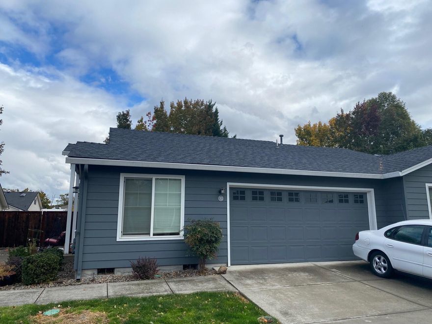 Great opportunity for an investor or first time homebuyer- lovely single level townhome offering a low maintenance lifestyle in a terrific central location. This shared wall 3 bed 2 bath open concept home offers a private fenced side yard w/ partially covered patio area, spacious master suite & fully finished attached 2 car garage. The kitchen is open to the dining room by passthrough/eating bar and has plenty of storage. Vaulted ceilings in the living & dining room w/ lots of natural light from the big transom window above the front door. HOA dues are $107 per month and includes the following: exterior, roof, grounds and sprinkler systems. Tenant occupied, give us a call to schedule a showing before it's gone!