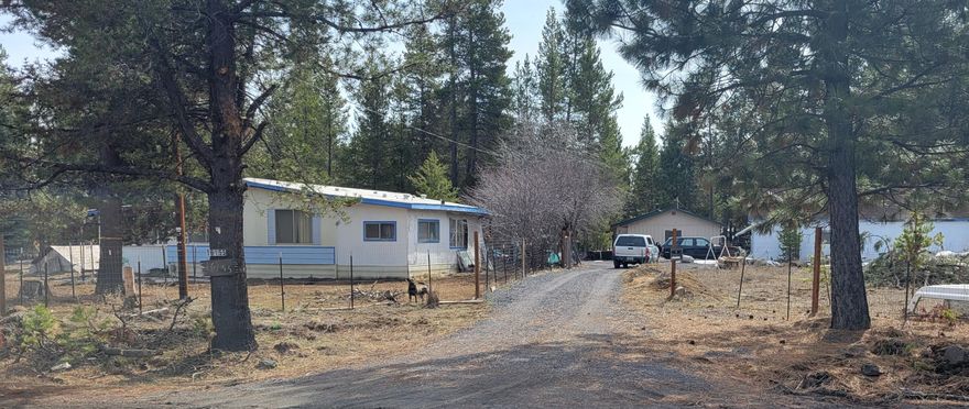 This piece of land has a lot of potential to fix up and make it your dream property! With a drive way that wraps around the back of the home, it gives you the chance to build your dream home with a lot of room to make your own! Oversized 2 car garage with workshop in the back will give you plenty of room! Come see for yourself the potential this land has to offer!