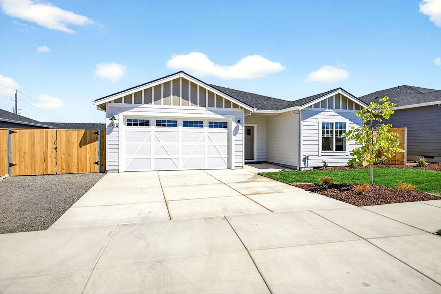 OPEN HOUSE SATURDAY JAN 10th 1:00 - 4:00pm & SUNDAY JAN 11th 1:00 - 4:00pm.
 Built in 2025 in a beautiful country setting in Medford area with views of the surrounding mountains nearby! An exceptional quality builder that we've grown to love in the valley throughout the years is what you get when you purchase a home built by Pac Trend Homes. A Stunning craftsman styled home with approximately 1718 sq ft, 3 bedrooms, 2 full baths. Features an open kitchen with beautiful granite counters, including high end light fixtures and brick fireplace. Custom cabinets are birch and alder with the highest quality in the industry. Luxury vinyl plank flooring in the entry , kitchen, living room and hallways. Bathrooms and laundry include tile flooring. Professional landscaping in front and back round out this house. Estimated completion date July 2025. Other lot and home packages are available. Listing agent is related to seller. Pictures are for illustration purposes only.