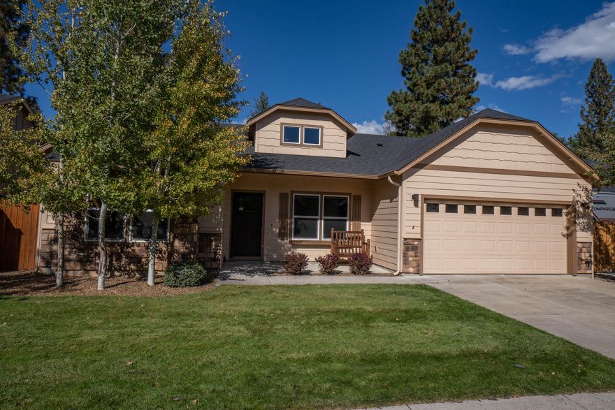 Welcome to this beautifully maintained single-level home offering comfort, privacy, and nature right at your doorstep. Built in 2013, thoughtfully upgraded, 4-bed, 2-bath home spans 2046 sqft on a generous 6098 sqft lot, perfectly positioned just one tax lot away from National Forest land and backing to a privately owned 20-acre parcel, a rare and serene setting. Step inside a spacious great room with a cozy fireplace, seamlessly connecting to a large kitchen featuring an island, breakfast bar, pantry, and ample cabinetry, ideal for gathering and everyday living. The primary suite is located in its own private wing, offering an ultimate retreat with direct access to the rear deck, walk-in closet, double vanity, soaking tub, private commode, and shower. No step raised back deck with gazebo, perfect for enjoying morning coffee or relaxing evenings surrounded by natural beauty. Do not miss this gem!