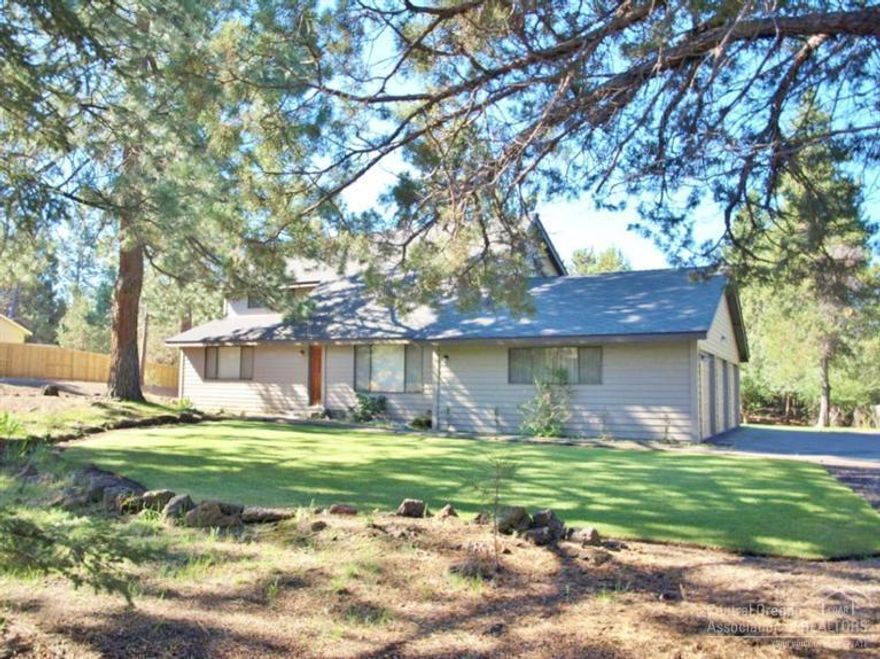 Where else can you live on a larger wooded private lot, and be so close to town!! Kings Forest - Fantastic detached 2640 sq.ft. shop, with 640 sq. ft. on the 2nd floor which could be a studio/apartment. The 1952 sq.ft., 2 bedroom, 2 bath home is situated on manicured park like setting with 2 decks, one off the master & ready for the hot tub. 3 car garage with shop area, central vac, new Rheem furnace-heat pump. You have to see this home and huge shop. Natural setting and just minutes from town.