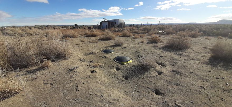 A rare find this land has sewer installed and approved for a 4 bedroom dwelling. CUP was approved in 2018 may be expired at this time call Lake County Planning department for further details..Located approx 8 miles from amenities. The most amazing sunsets and starlit nights.Start planning your future homesite. You live a high-desert adventure focused on outdoor recreation like ATV riding & sandboarding at the vast Dunes, exploring unique geology at Crack in the Ground & Devils Garden, hiking, fishing, birding, and historic sites like the Homestead Village Museum, with amenities including RV parks, local eateries, and spectacular dark sky stargazing, all centered around the remote, scenic beauty of Lake County.